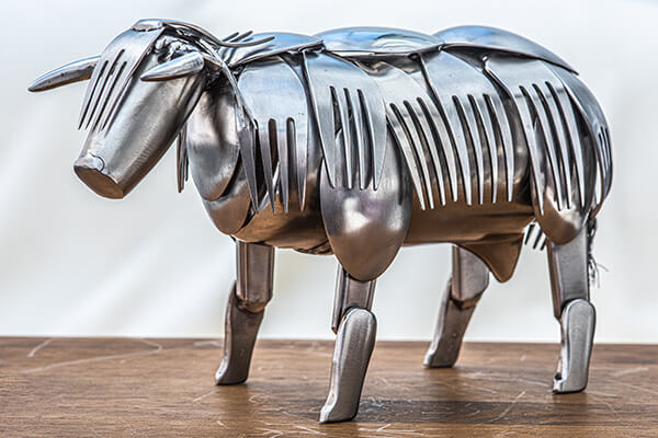 A metal cow made from forks by Darrell Olsen, using hobbyweld welding gases